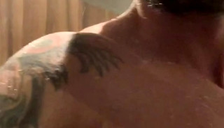 sexy men shower together and rub their naked bodies