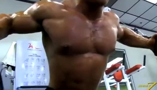 Gerard Dietrich Lifting Weights, Flexing, and Posing