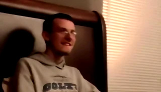 Two amateur freaks jerk off together in a cheap motel room