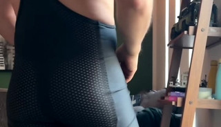 Hunk in black mesh singlet strokes his wienie