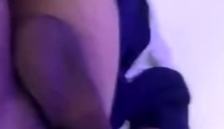 Dark-haired man masturbating after a day's work.