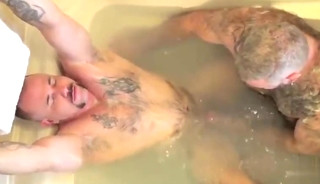 Father and son taking a hot bath