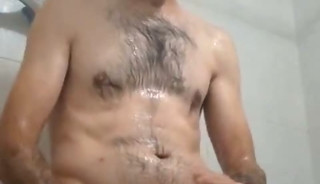 Straight guy with a huge cock jerks off in the shower until he gets all the milk out.