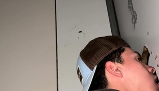 sucking a big black cock glory hole