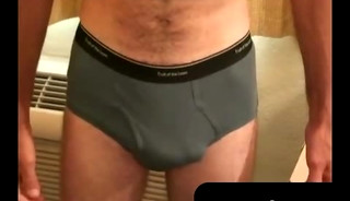 Rough older guy strips naked and tugs his big hard cock vigorously