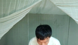 Sweet Asian boy masturbates, moans, cums and eats cum lying on old cot in abandoned factory dormitor