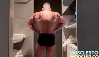 Young Alpha Bodybuilder Flexes Big Muscles