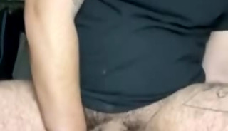 Hairy guy with toy