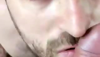 Sniffing a large uncut hairy dick