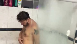 A homeless man just wanted a shower, but ended up eating the young guy's ass in the shower.