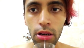 Filling a glass with spit and jerking off with it untill I cum and drink my cum.
