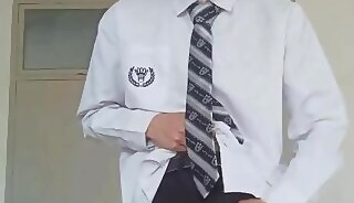 Young Chinese student jerks off in class