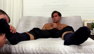 Aspen masturbates big cock while getting foot worship