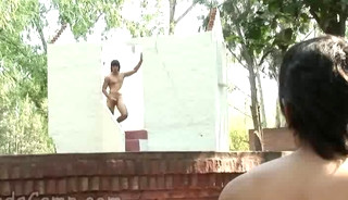 Young gay hunk whips out his rod for outdoor oral