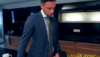 Elevator sex for a pair of businessmen in expensive suits