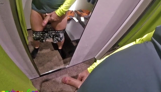 In front of several mirrors, I pleasurably masturbate my thick foreskin cock in the changing room