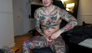 Heavily Tattooed Guy Shows Hole and Jerks-off