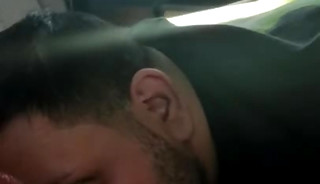 Dude getting head in the car at the parking lot