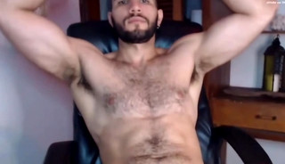 Cum shot of hot guy showing off hairy armpits