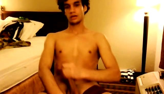 Super hot young man jerking off and making his dick cum