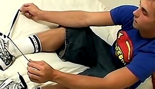 Handsome jock Kelly Cooper sucks toes and jerks his dick